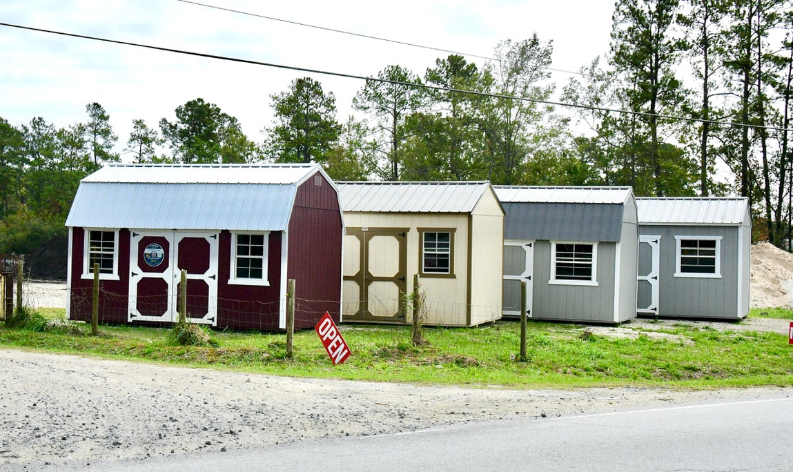 Old Hickory shed display lot — multiple styles available at Mr Topsoil